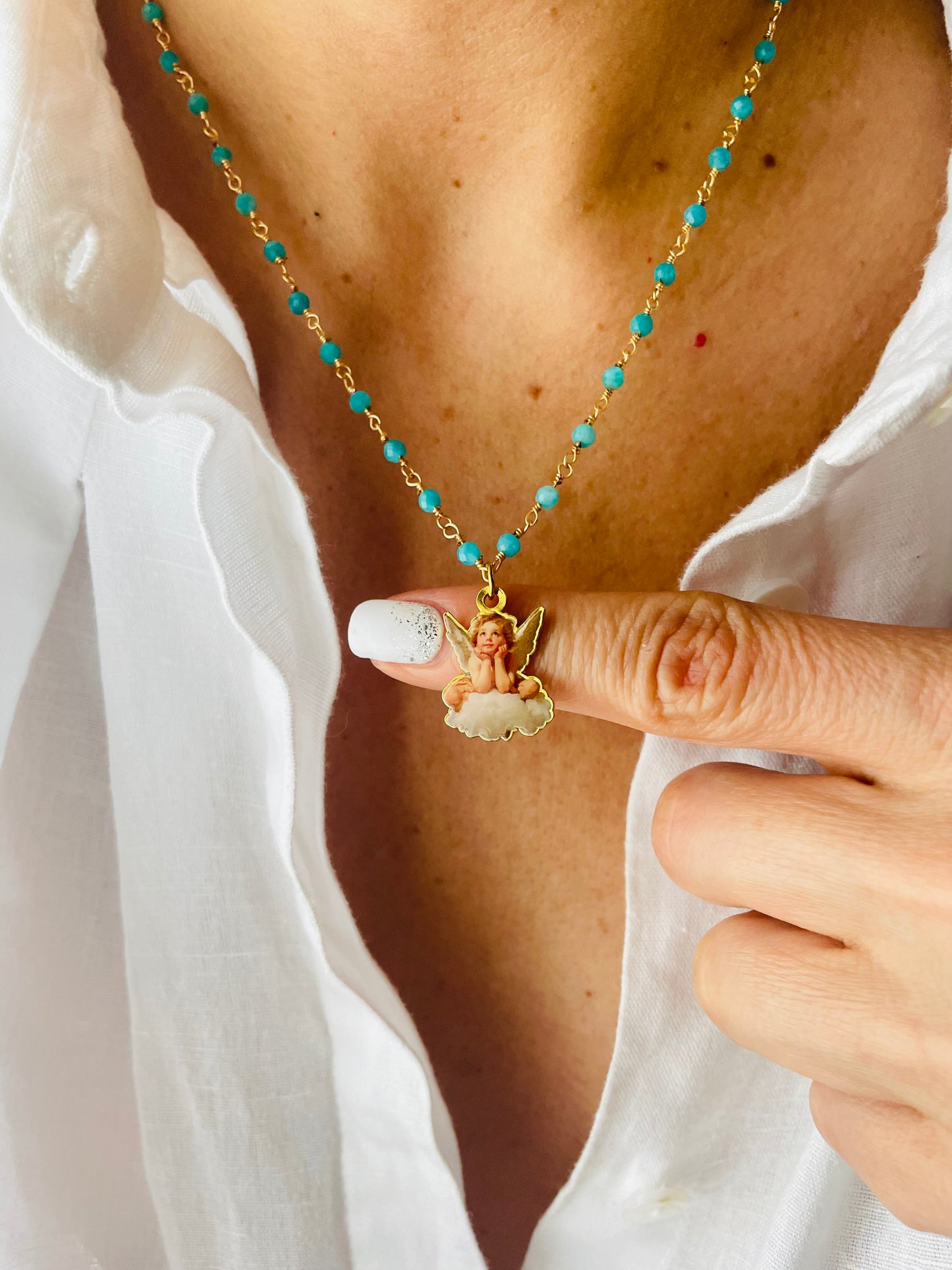 COLLANA THEOS