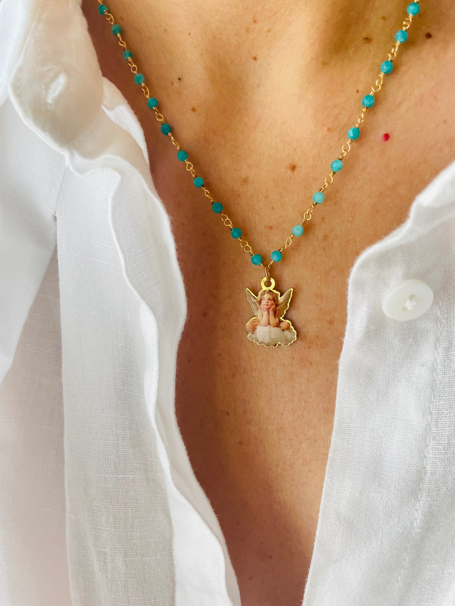 COLLANA THEOS